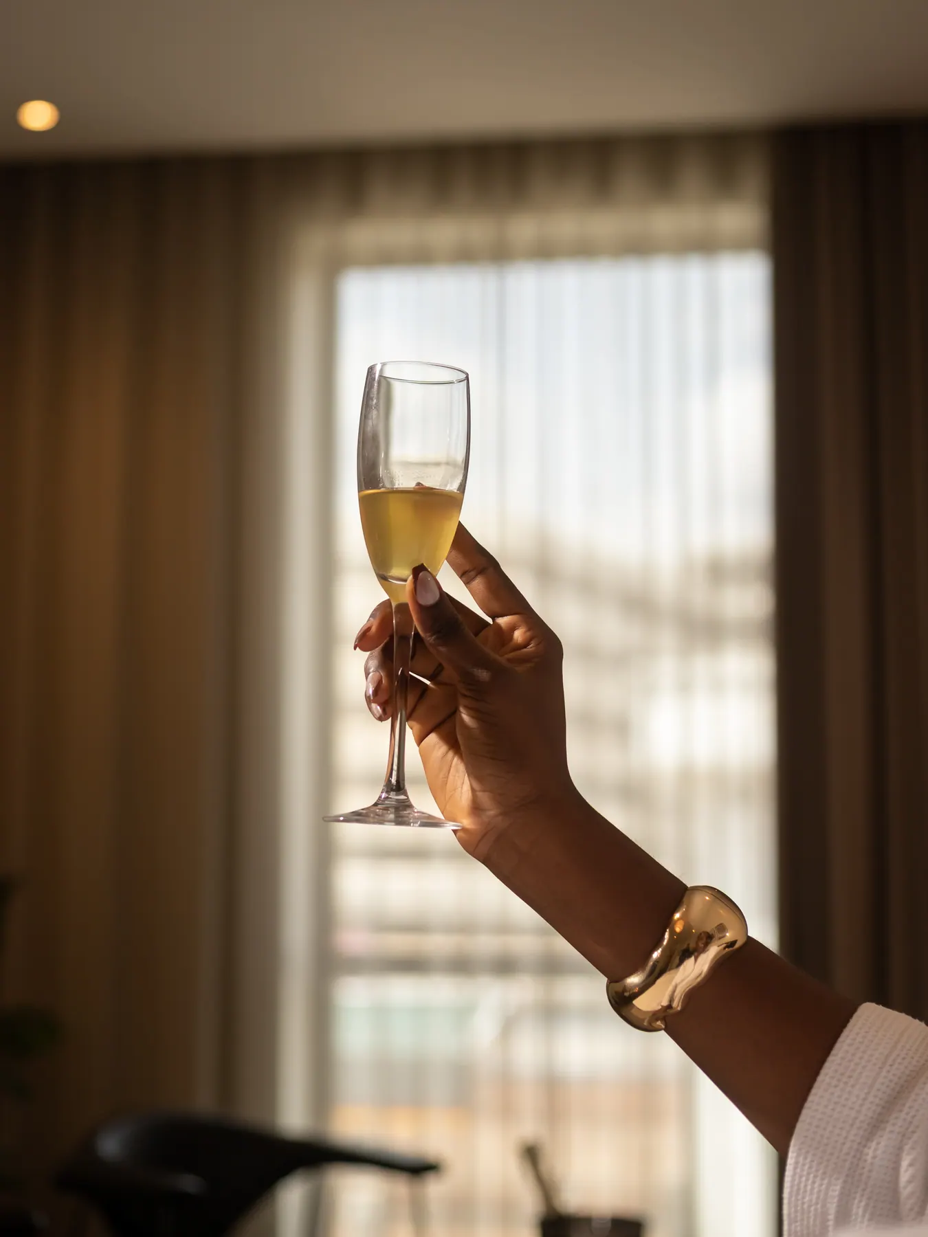 A quiet celebratory toast during an Abuja stay