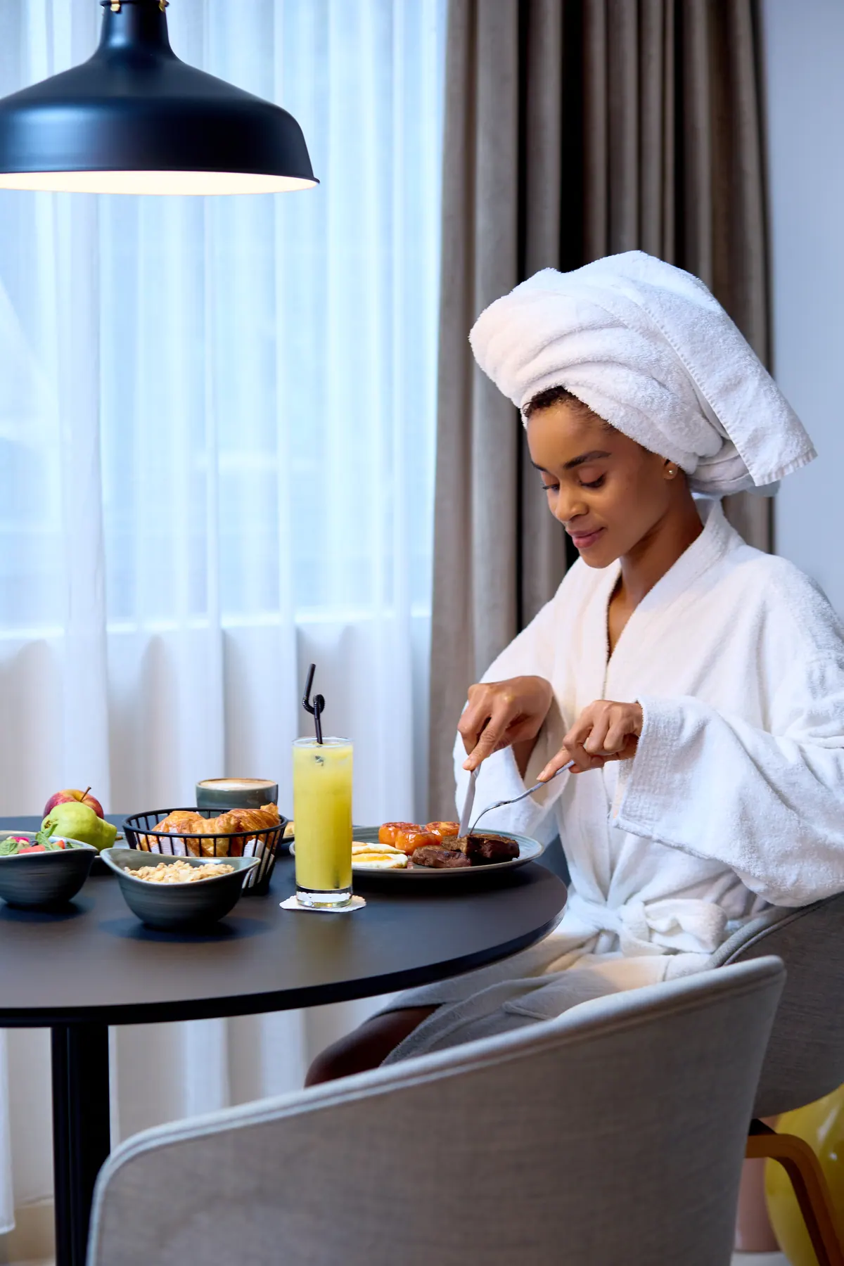 Guest enjoying breakfast at Nordic Hotel Lagos