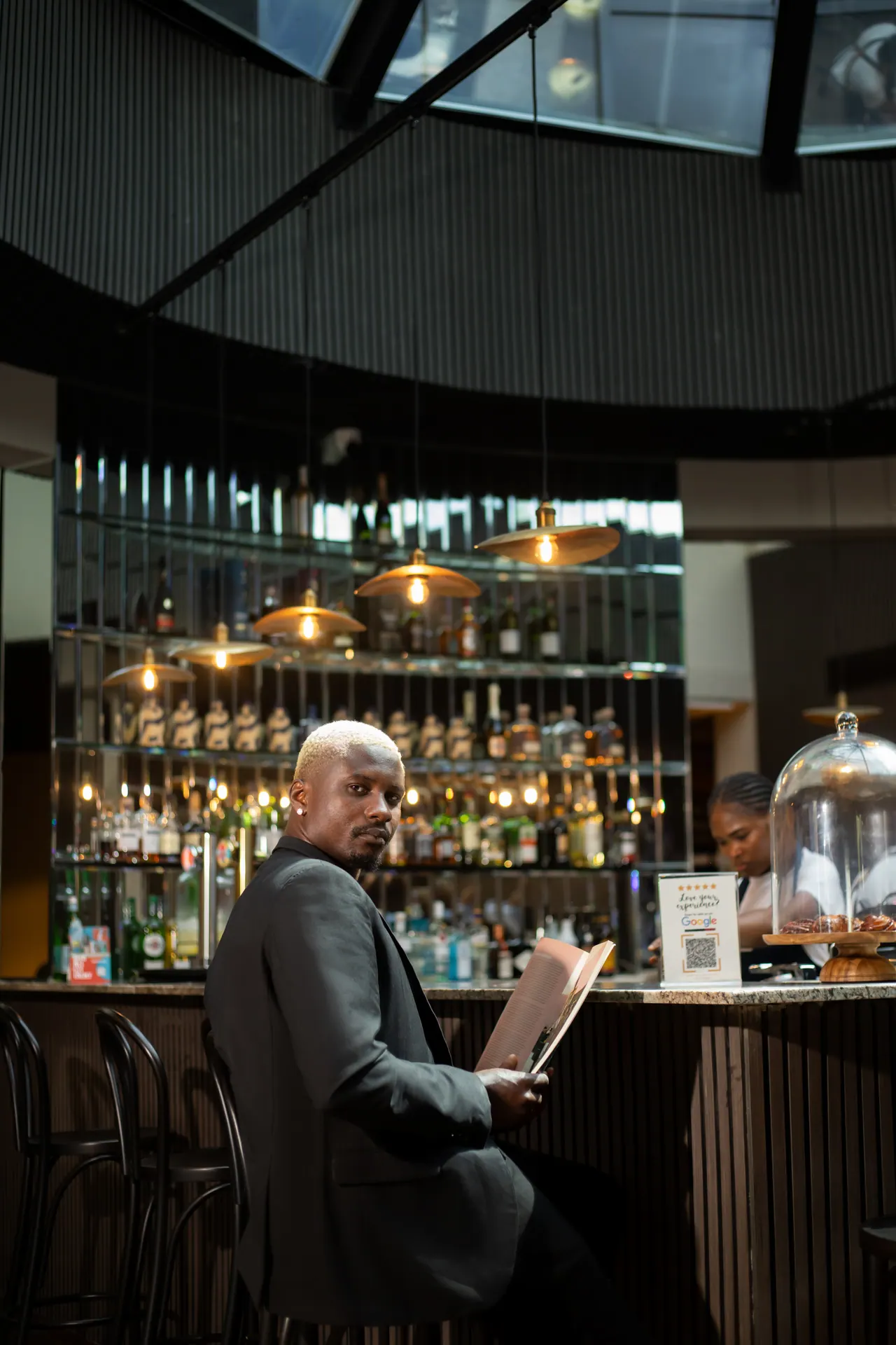 Guest at the bar in TARO Bistro and Bar