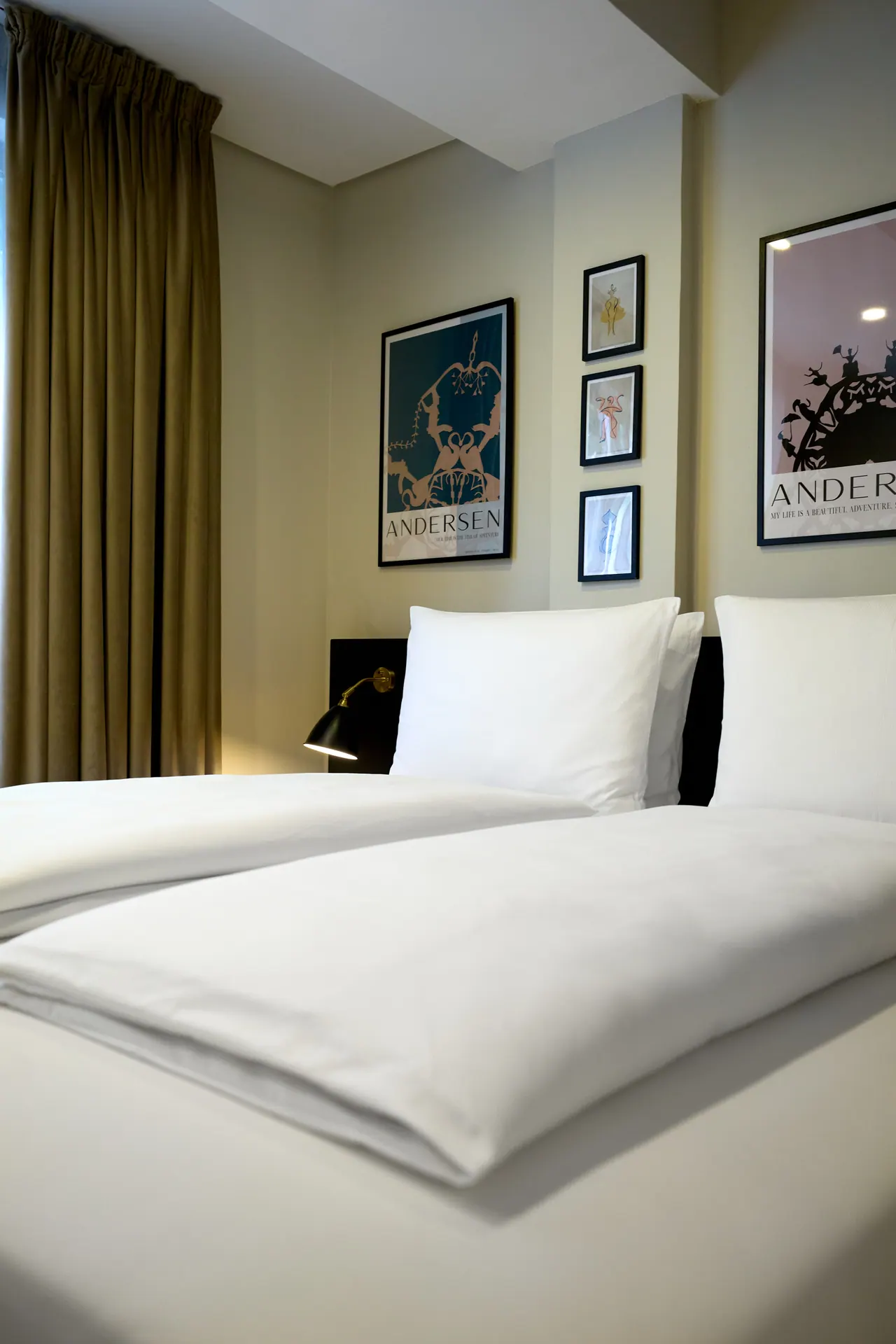 Crisp white bed linen in a Nordic Hotel Lagos guest room